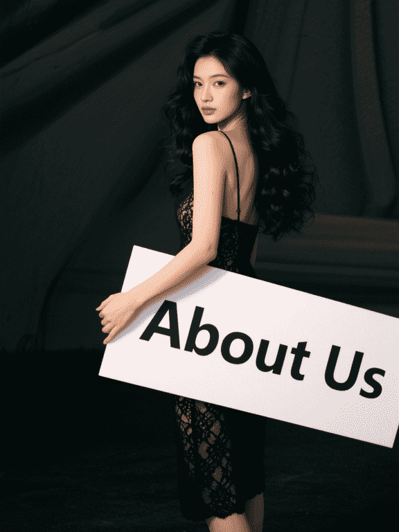 Woman holding a sign that says "About Us