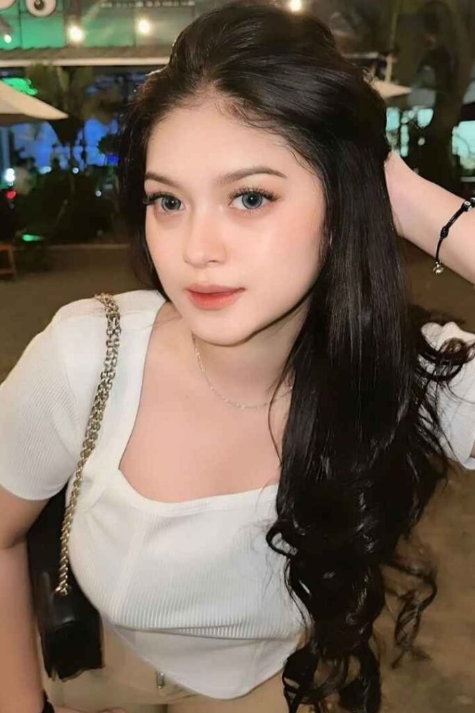 Attractive young woman with long dark hair.